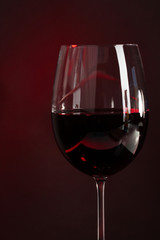 Wine in glass on dark background