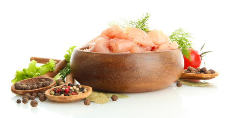 raw chicken meat in bowl, isolated on white