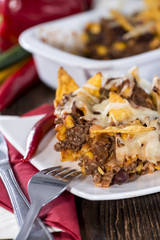 Nachos gratinated with cheese