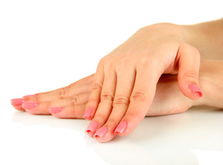 Beautiful woman hands with pink manicure, isolated on white