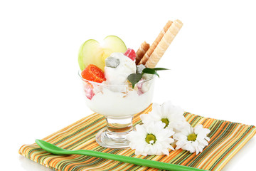 Ice cream with wafer sticks on napkin on white background