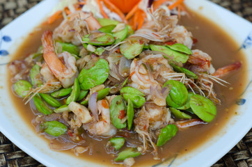 Fried Parkia with shrimp and source.