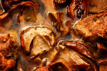 Mushrooms fried with meat and potatoes