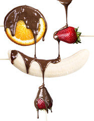 strawberries, orange and banana with chocolate © boule1301