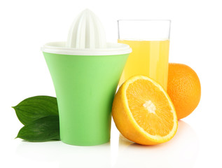 Citrus press, glass of juice and ripe oranges, isolated on