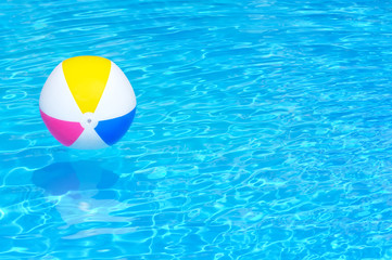 Inflatable ball in swimming pool