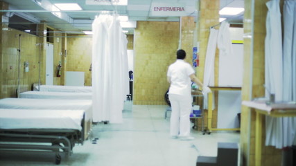 Empty bedrooms of an hospital in Latin America - Powered by Adobe