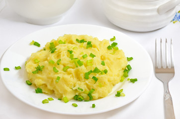Mashed potatoes on a white plate