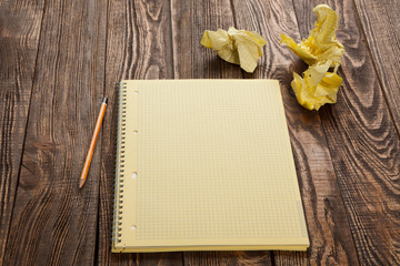 Notepad on a wooden table