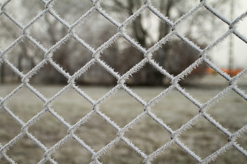 wire fence with hoarfrost