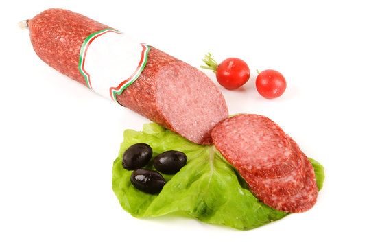 Salami stick with blank label and slices around