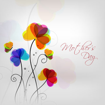 Colorful flowers with text Mothers Day on grey background.