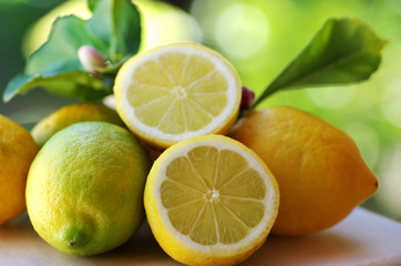 Ripe lemons on table