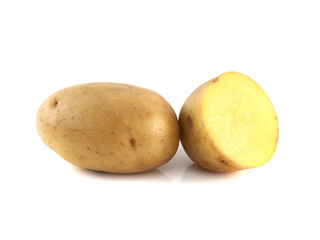 New potato with sliced half isolated on white