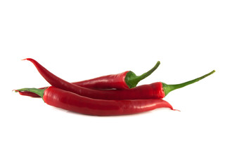 Red chili hot peppers on white background.