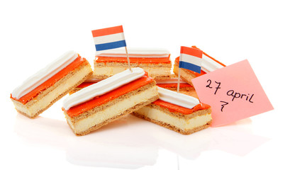 Traditional Dutch pastry called tompouce with flags