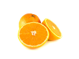 Orange with two sliced halfs isolated on white