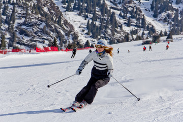 Fototapeta na wymiar athletes skiing in the mountains