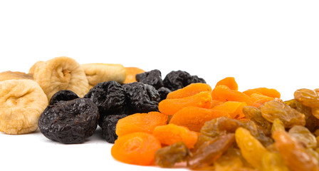 prunes, figs, dried apricots isolated on white background
