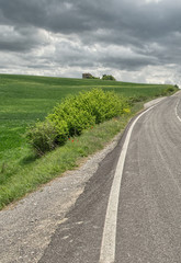 Fototapeta premium Beautiful Tuscan road in spring, Italy