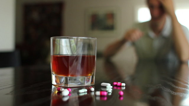 Substance abuse with man in background