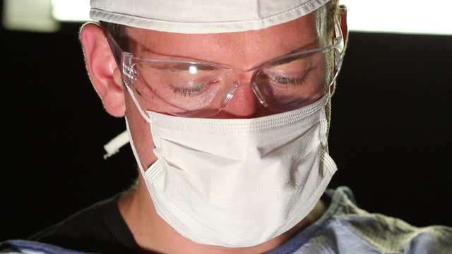 Surgeon slips and cuts patient, blood shoots him in the face
