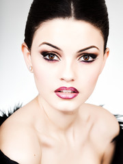 professional make-up and hairstyle on beautiful woman face