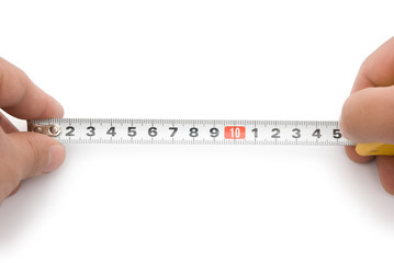 hands holding a tape measure with clipping path