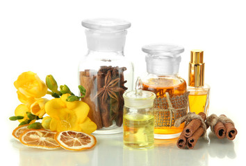 Bottles with ingredients for the perfume, isolated on white