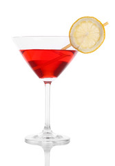 Red cocktail in martini glass isolated on white