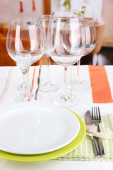 Table setting with glasses for different drinks