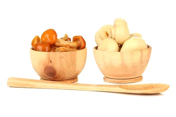 Foto op Plexiglas Mushrooms in wooden bowls, isolated on white © Africa Studio