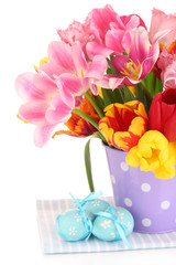 Easter composition with fresh tulips and easter eggs isolated
