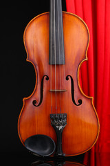 Classical violin on curtain background