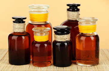 Medicine bottles on beige background