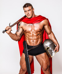 Huge warrior with sword, helmet and mantle