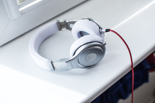 White headphones on the sill
