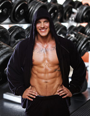 Fototapeta na wymiar Image of muscle man in gym