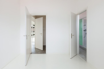 White apartment Interior, two doors open