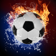 Fototapeta na wymiar Soccer ball in fire flames and splashing water
