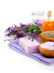 Fototapeta na wymiar Spa treatment. Lavender bath salt, soap, oil and lavender flower