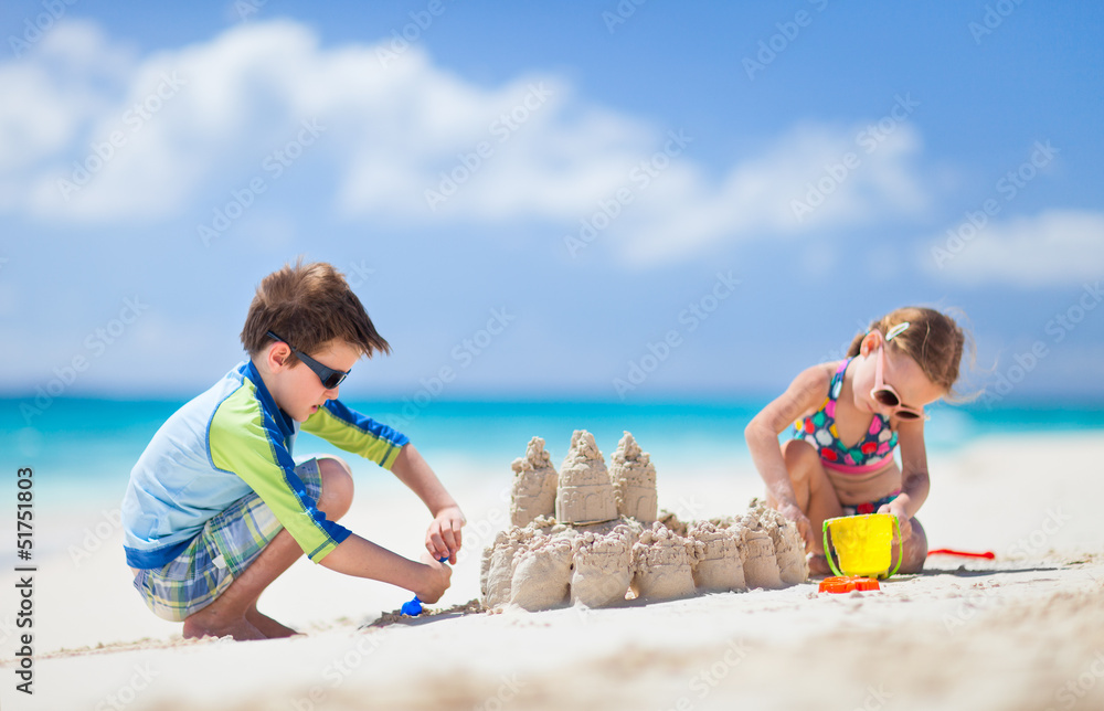 Poster two kids playing at beach