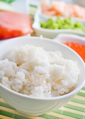 ingredients for sushi, sakmon and cucumber