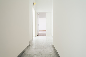 White apartment Interior, view of the corridor