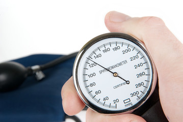 Hand holding a sphygmomanometer isolated on white background
