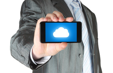 Businessman holds smart phone with cloud computing concept 