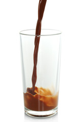 Hot chocolate pouring into glass on white background.