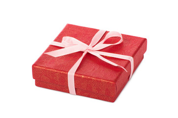 Single red gift box with pink ribbon