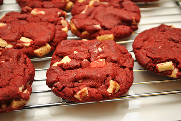 Homemade Red Velvet Cookies Cooling on White