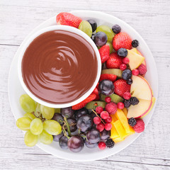 chocolate sauce and fruits